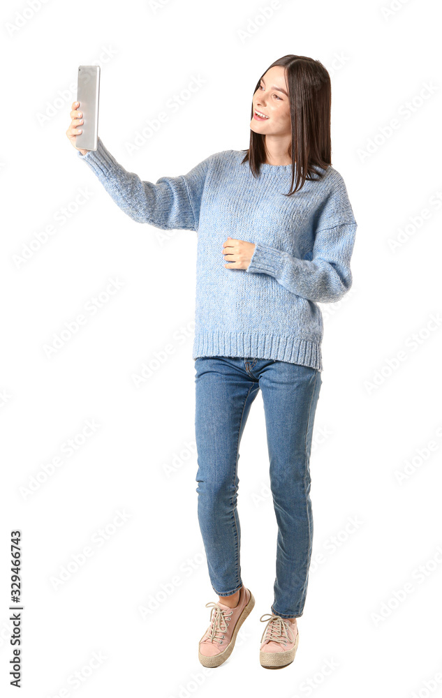 Young woman with tablet computer on white background Young woman with tablet computer on white background