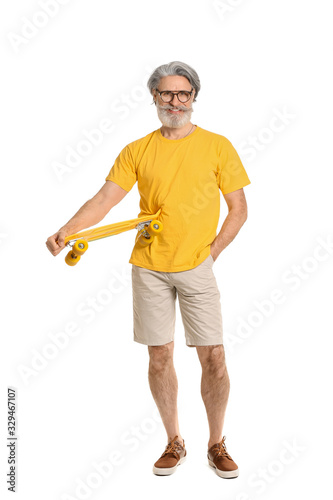 Stylish elderly man with sk...