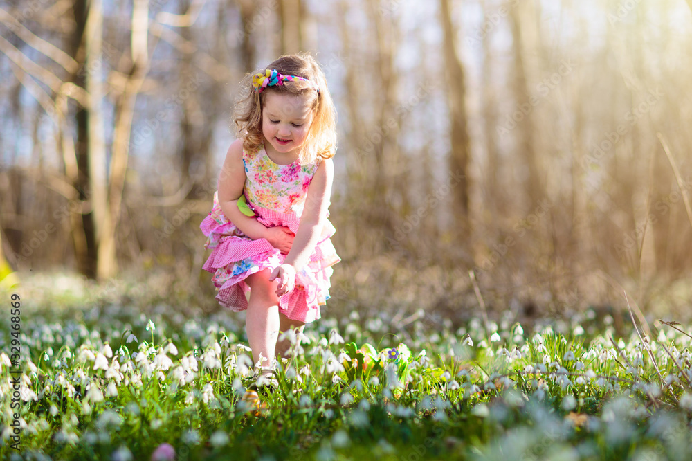 Easter egg hunt. Kids with eggs. Easter egg hunt. Kids with eggs.