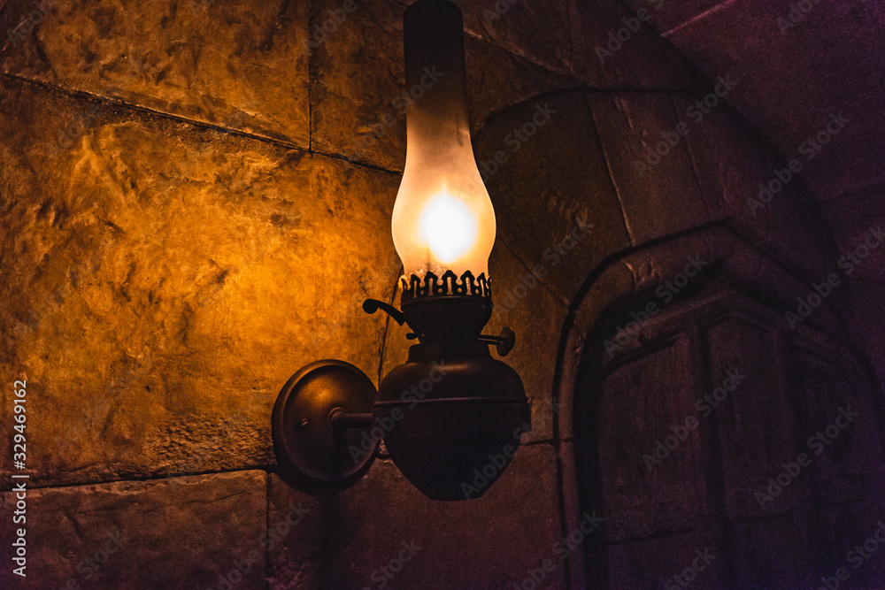Vintage wall lamp in the dark.