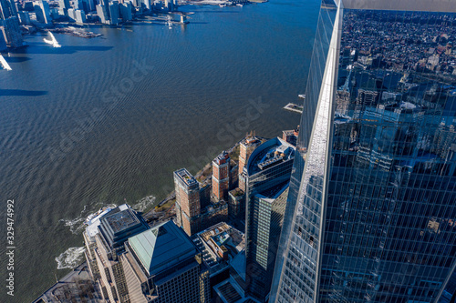 Aerial view of New York city and one world trade center brookfield place at day time