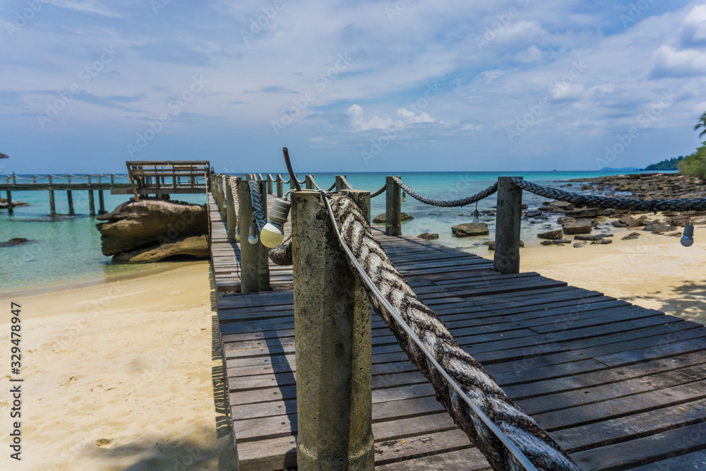 Sea beach white sand with wooden bridge Sea beach white sand with wooden bridge