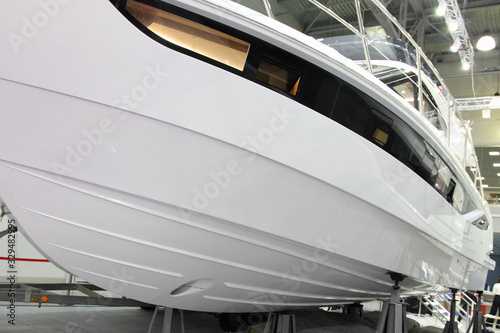 Obraz na płótnie Modern powerful motor boat bottom with bow thruster steering hole and redans w salonie