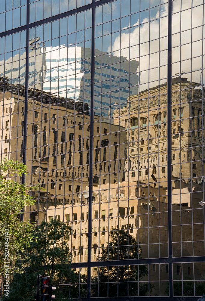 Naklejka premium Montreal: The old reflected in the new
