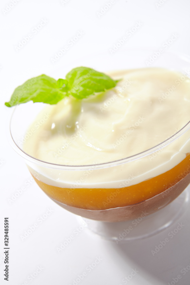 Vanilla Mousse Dessert with Chocolate and Mango Isolated Vanilla Mousse Dessert with Chocolate and Mango Isolated