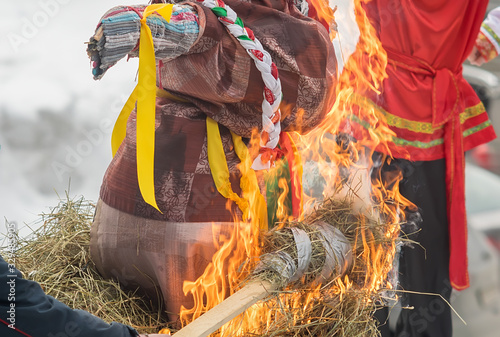 Tableau sur toile a burning stick with straw that sets fire to a female effigy at the winter festi