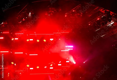 Red light on a rock concert stage as background