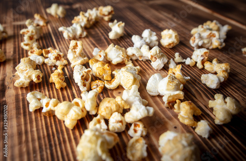 Popcorn flakes on a wooden background