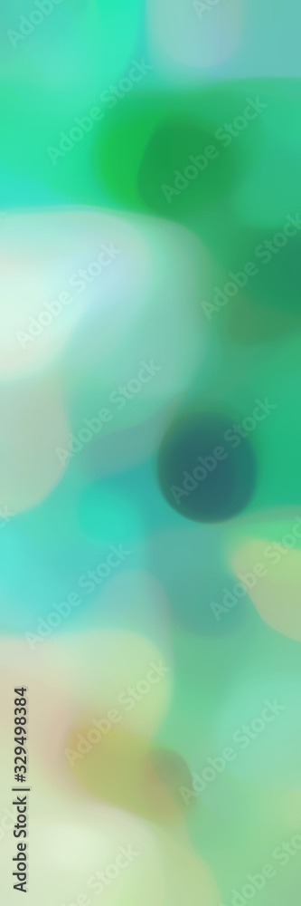 unfocused bokeh vertical format background with medium aqua marine, pastel gray and dark sea green colors space for text or image