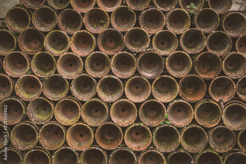 Old ceramic plant pots covered with moss Old ceramic plant pots covered with moss