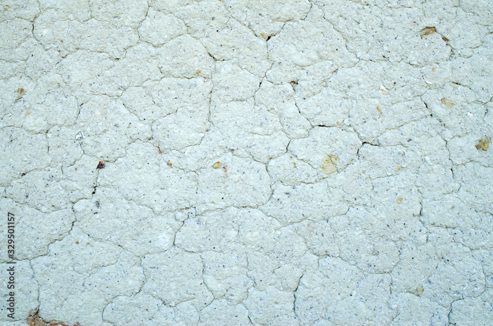 Old mud plaster on wall close up Old mud plaster on wall close up
