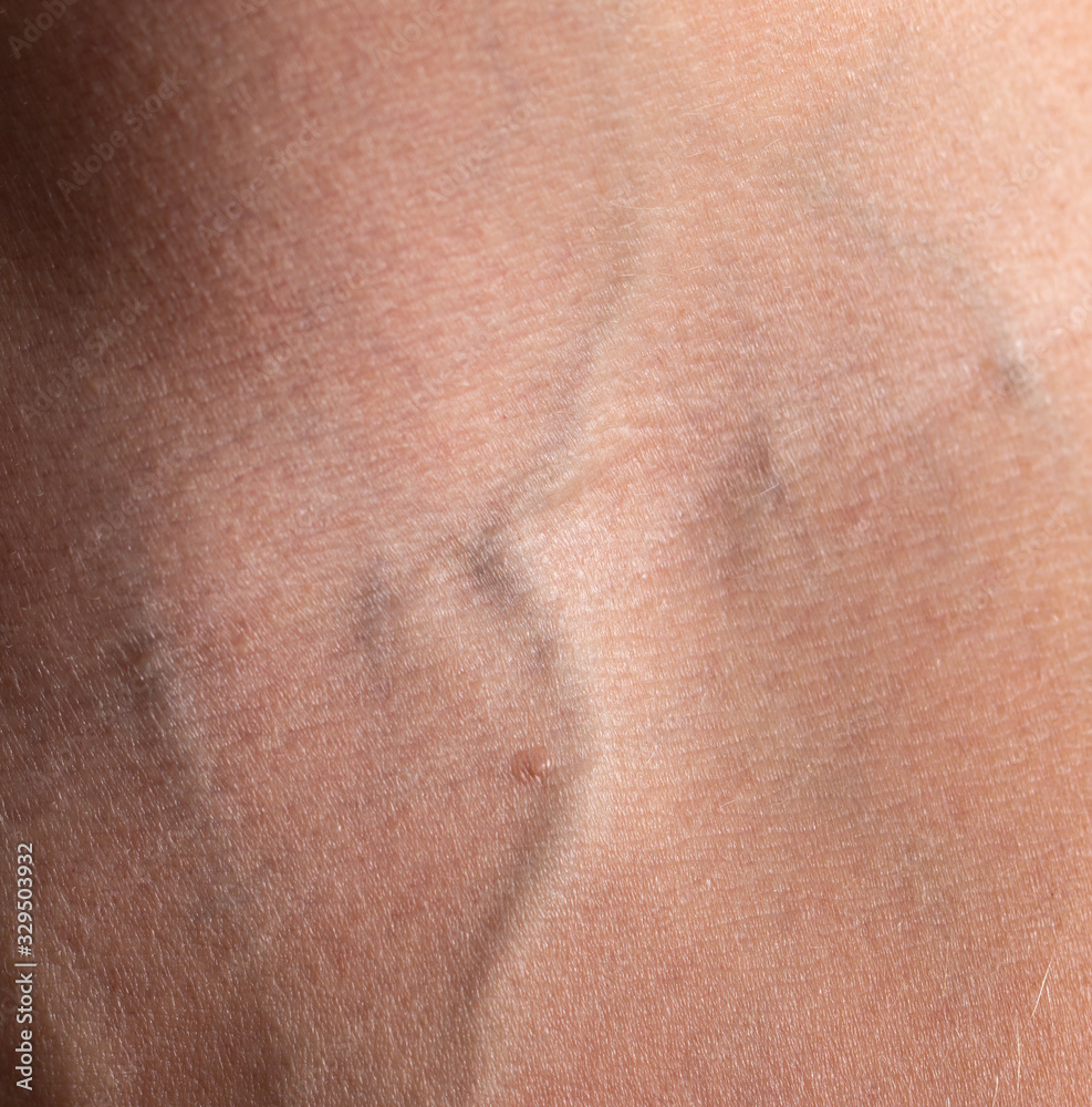 Fototapeta premium veins on a male hand as a background