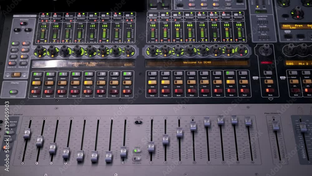 A Colorful Sound Music Mixer Adjusting Volume Faders Rapidly and Flashing Blinking Lights A Colorful Sound Music Mixer Adjusting Volume Faders Rapidly and Flashing Blinking Lights