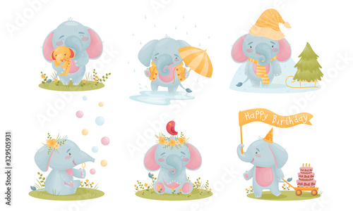 Cute Smiling Elephant Character Engaged in Different Activities Vector Set