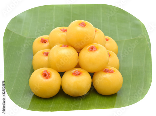 Saneh Jaan Thai dessert on banana leaf on white background. photo