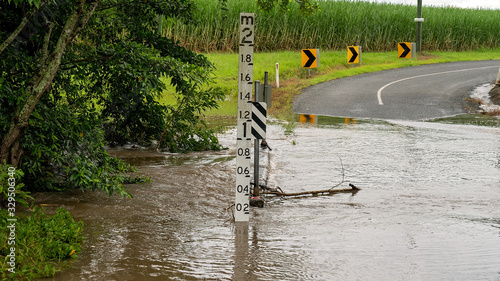 Photography Heavy Tropical Rainfall Causes Flooding Over Creek Road
