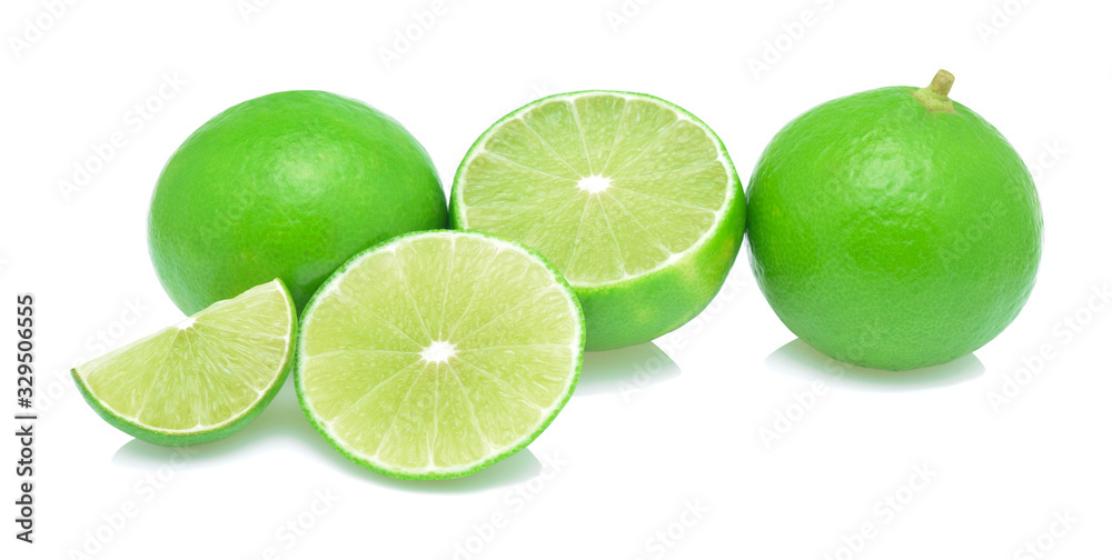 Fresh lime with slice isolated on white background.