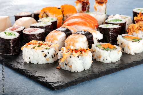 Large sushi set. Many different maki, nigiri and rolls