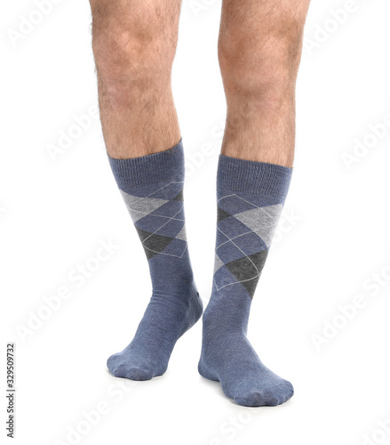 Male legs in socks on white background © Pixel-Shot