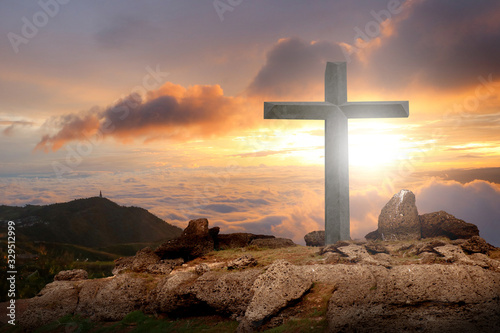 Cross, crucifixion, jesus, christ, easter, on a mountain with a sunset background