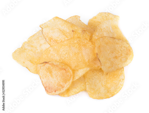 Handful of yellow potato chips