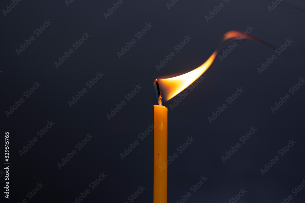 Yellow candles, burns, illuminates, for celebrations, and for romance, of love Yellow candles, burns, illuminates, for celebrations, and for romance, of love