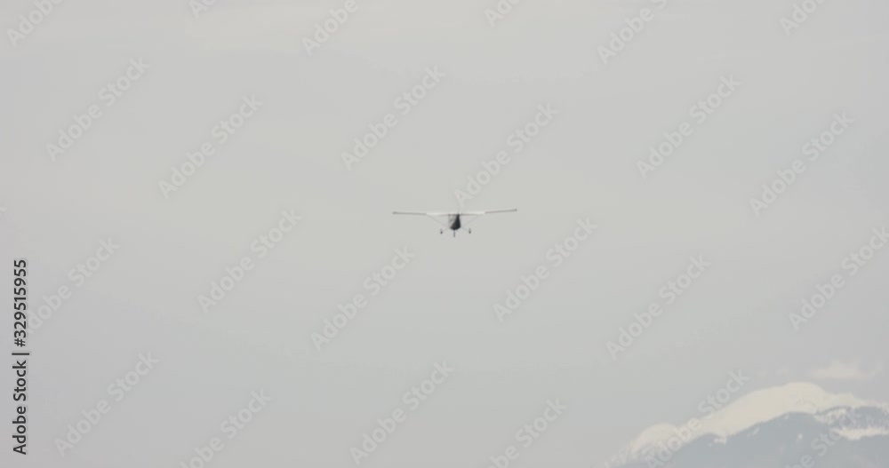 Small aircraft airplane landing on european airport brnik Small aircraft airplane landing on european airport brnik