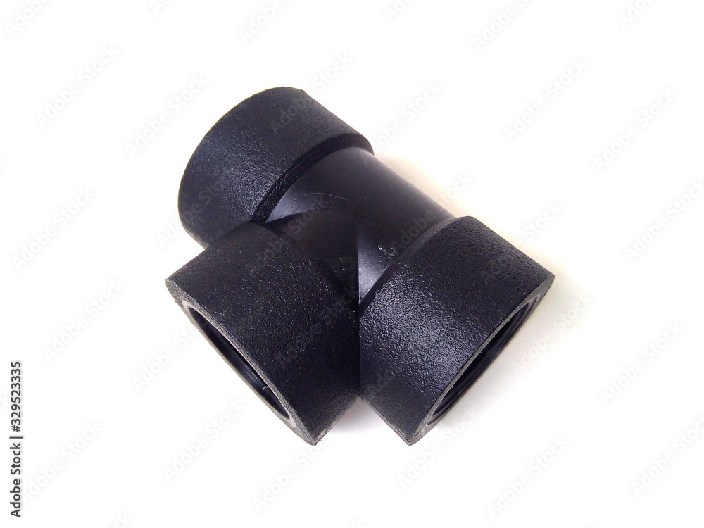 Close up of black plastic pipe fitting isolated on white background. Water pipe. Close up of black plastic pipe fitting isolated on white background. Water pipe.