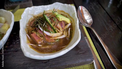 Ceviche tasting: classic style, mixed ceviche and Nikkei style ceviche. Fresh fish, seafood, seaweed and tuna.