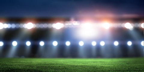 Night football arena in lights close up