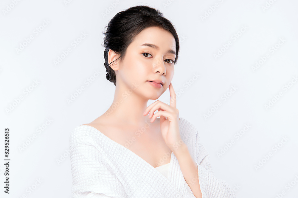 Beautiful Young Asian Woman with Clean Fresh Skin. Face care, Facial treatment, Cosmetology, beauty and healthy skin and cosmetic concept .woman beauty skin isolated on white background Beautiful Young Asian Woman with Clean Fresh Skin. Face care, Facial treatment, Cosmetology, beauty and healthy skin and cosmetic concept .woman beauty skin isolated on white background