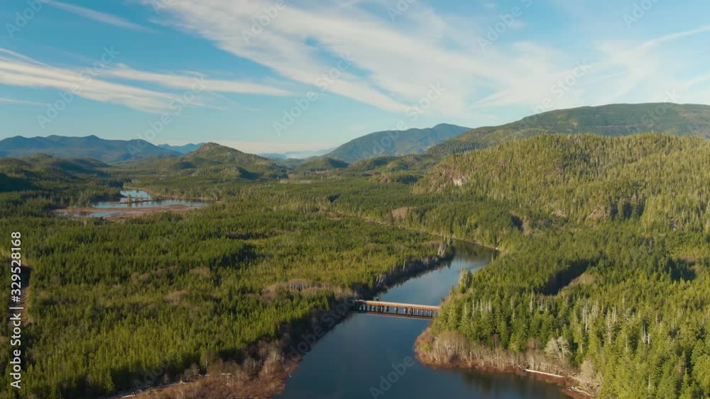 Beautiful Aerial View of Kennedy Lake during a vibrant sunny day. Located on the West Coast of Vancouver Island near Tofino and Ucluelet, British Columbia, Canada. Beautiful Aerial View of Kennedy Lake during a vibrant sunny day. Located on the West Coast of Vancouver Island near Tofino and Ucluelet, British Columbia, Canada.