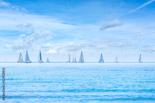 Sailing boat yacht regatta race on sea or ocean water