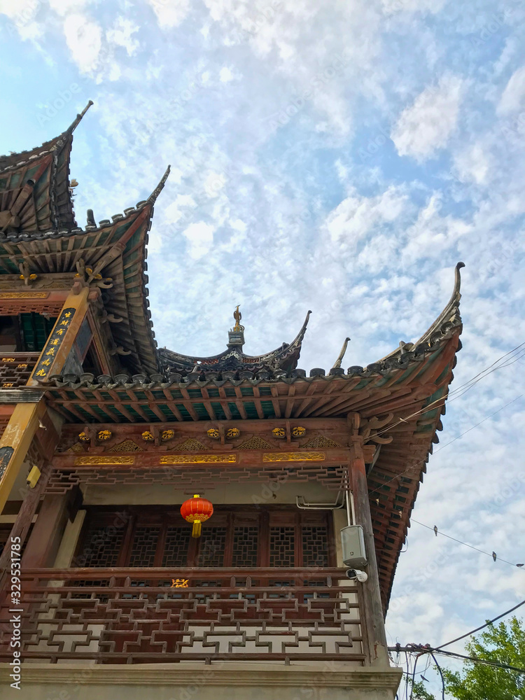 Traditional Asia Chinese architecture garden temple and tower in daytime Traditional Asia Chinese architecture garden temple and tower in daytime