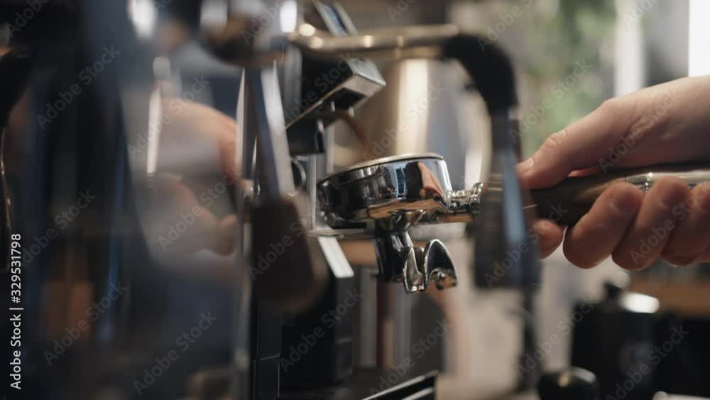 Grinding espresso coffee beans close up Grinding espresso coffee beans close up