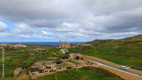 Aerial view over Basilica Ta Pinu in Gozo - a national shrine - aerial photography photo