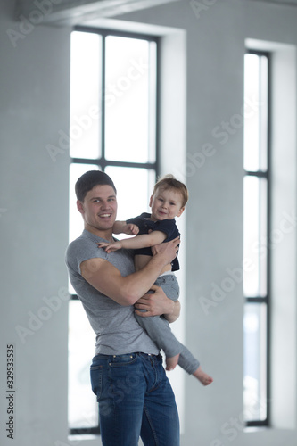 happy father's day! cute dad and son hugging