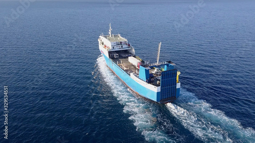 Ro Ro Ship: Aerial view of a medium RoRo Vehicle carrie vessel cruising at sea. © MagioreStockStudio