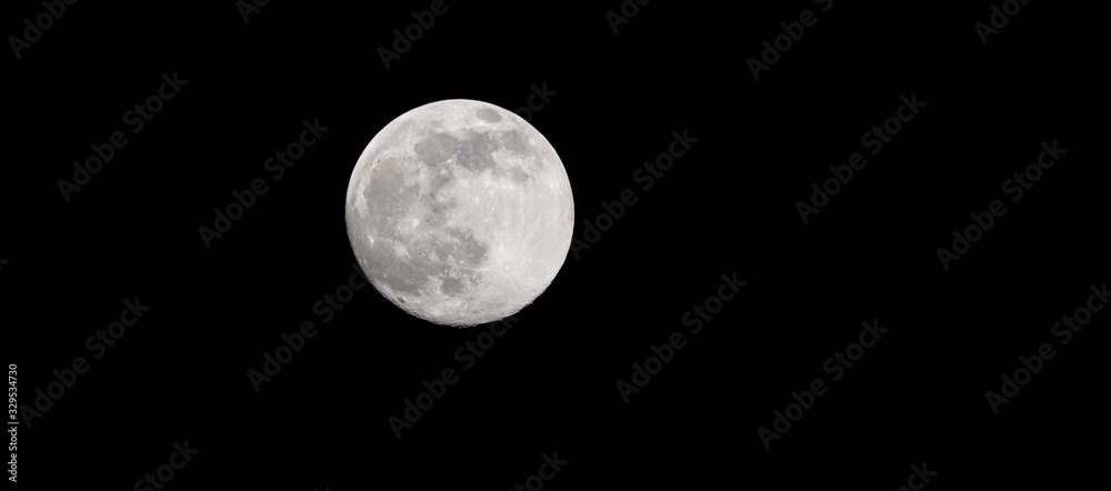 Obraz premium Closeup of a Full Moon in a Black Sky