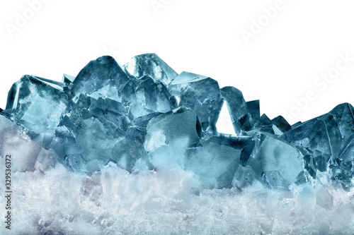 dark cyan topaz crystals isolated on white photo