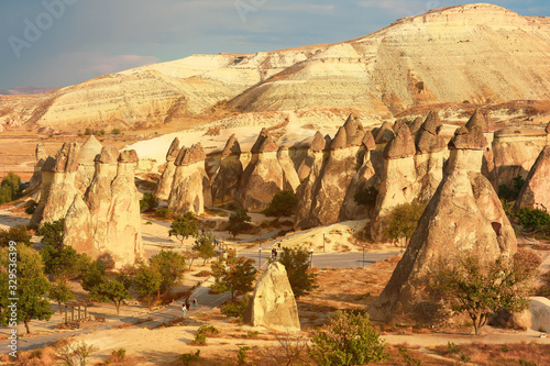 Valley with the sandy mountains of Cappadocia. Fantastic landscape. photo