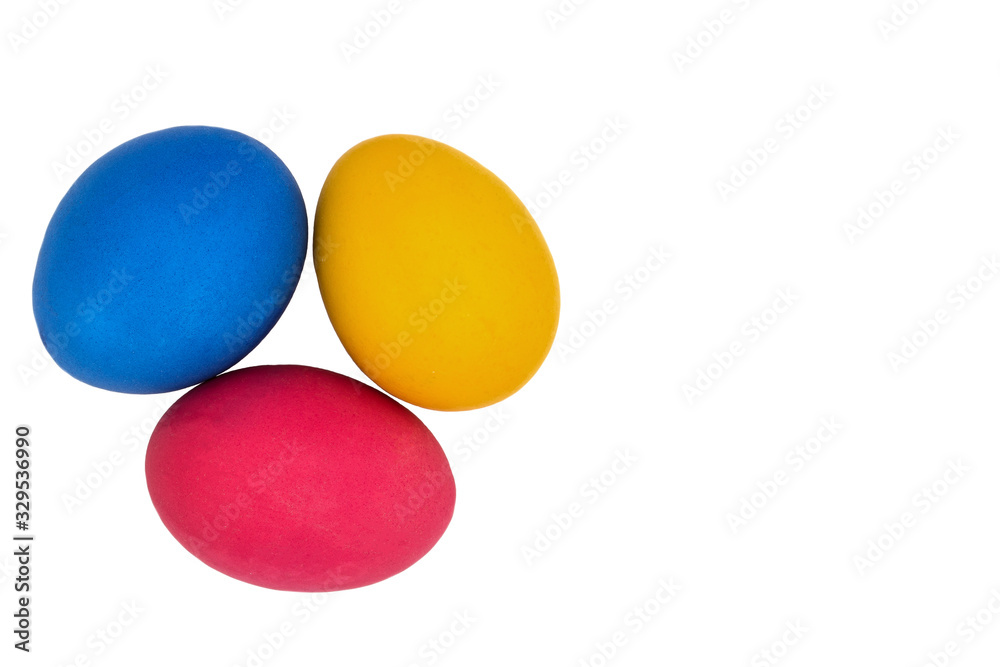 Easter eggs on a white background. Colors are red, blue, yellow.