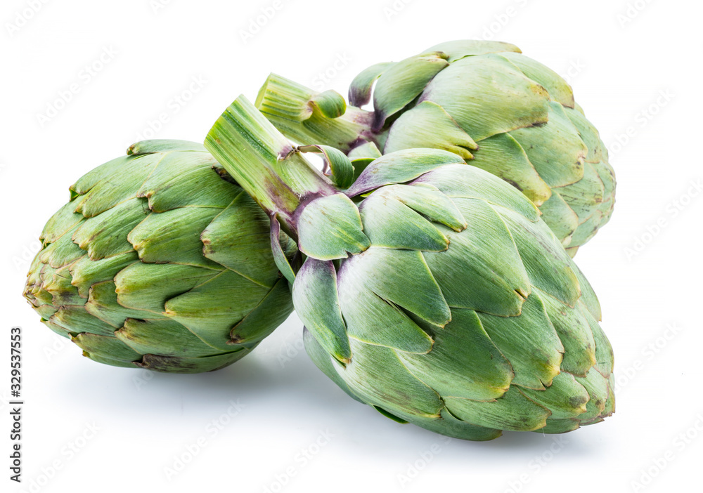 Fototapeta premium Artichoke flower edible buds isolated on white background.