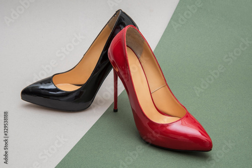 red and black female shoes stiletto