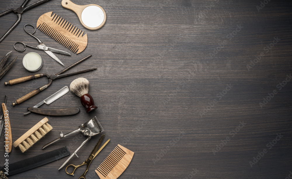 Classic grooming and hairdressing tools on wooden background. Classic grooming and hairdressing tools on wooden background.
