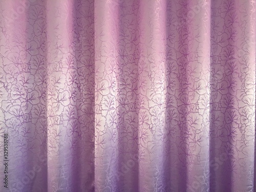 Purple curtain on the wall