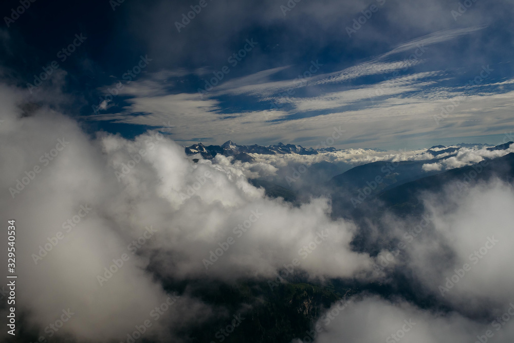 Swiss Alps, Beautiful Alps, Mountains in clouds Swiss Alps, Beautiful Alps, Mountains in clouds