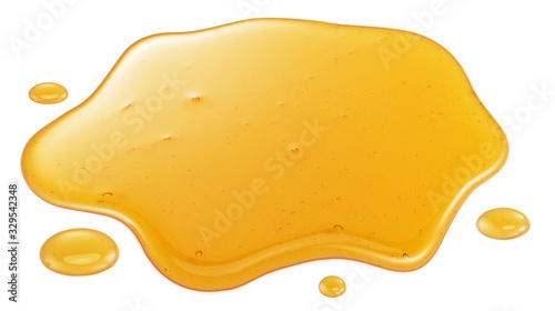 Sweet sticky honey puddle isolated on white background.