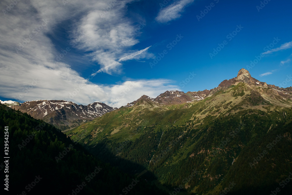 Fototapeta premium Swiss Alps, Beautiful Alps, Mountains in clouds