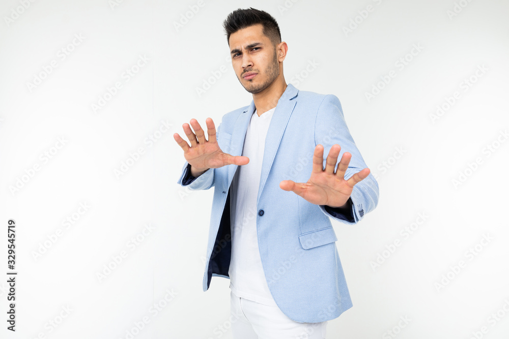 serious man in a classic image refuses on a white background with copy space serious man in a classic image refuses on a white background with copy space